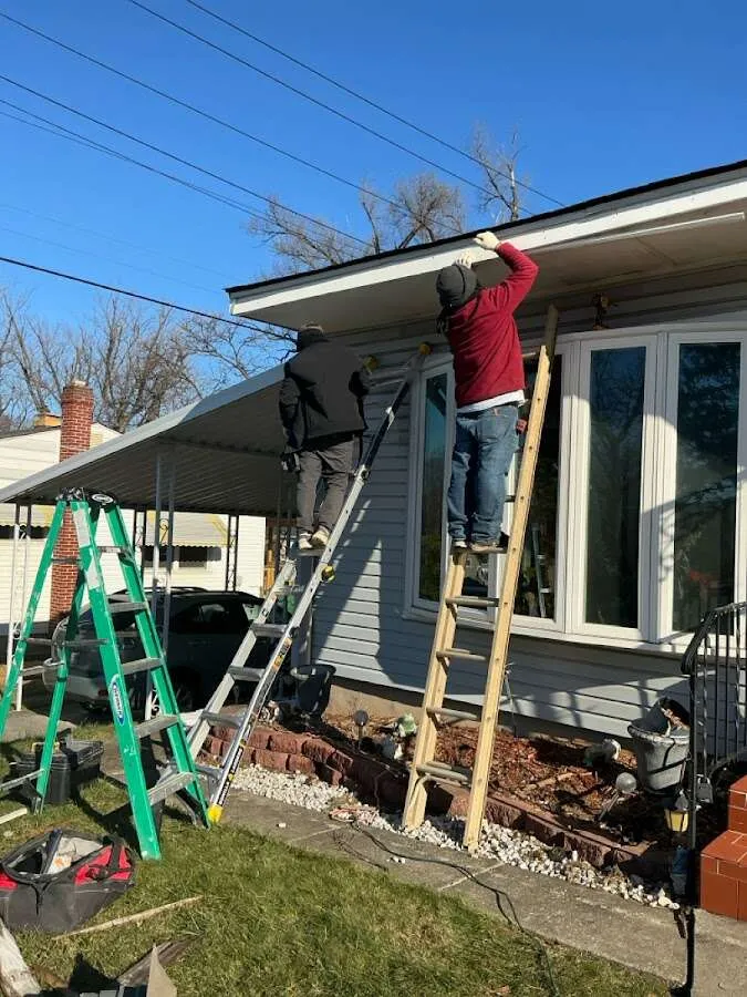 Restoration crew performing exterior repair in West Pleasant View