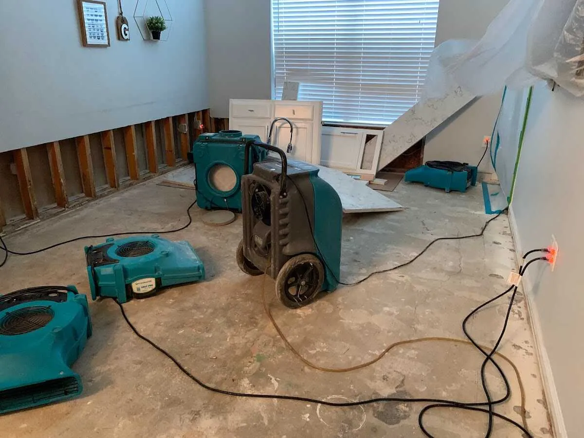 Dehumidifier in flood-cut room for Water Damage Restoration in West Pleasant View
